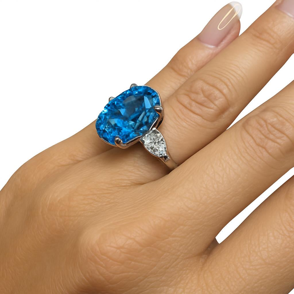 Anel oval de pedra de safira lab light blue de 10 quilates e duas moissanites gotas de 80 pontos